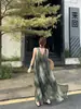 Vestido Longo Sem Mangas Fashionável para Férias na Praia Feminino Verão 2026 Decote V Profundo Design Degradê Vestido Chique