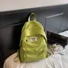 Mochila de Gran Capacidad Estilo Coreano Letra Color Sólido Mochila Casual Estudiantes de Secundaria Clase Viaje Diario Mochila de Alto Valor