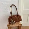 Bolso de mano de diseño minimalista de nicho para mujer, nuevo de verano 2026, versátil, de alta gama, gran capacidad, tipo almohada, bolso de hombro