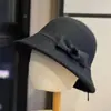 Sombrero de pescador de lana vintage para mujer, sombrero de cubo de lana con lazo, casual y versátil, adelgazante, sombrero de fieltro cálido para mujer