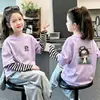 Camiseta a rayas de manga larga de algodón puro para niñas, un top redondo moderno y versátil para primavera y otoño, diseñado para parecer un conjunto de dos piezas