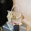 Bolsa de Mão Tecida de Entrada Elegante de Luxo de Nicho Feminina 2025 Nova Moda Versátil para Trabalho Ombro Transversal Sela