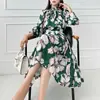 Comercio exterior ropa de mujer nuevo conjunto de dos piezas 2023 otoño estampado con cordones y lazo camisa ajustada a la cintura falda de gran vuelo a la moda conjunto