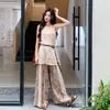 Moda Verão 2026 Casual Preguiçoso Retrô Tricô Vazado Sem Mangas Calça de Pernas Largas Conjunto com Cinto