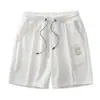 Pantalones cortos de gofre de estilo americano de moda transfronterizos para hombre, pantalones casuales holgados de longitud media para verano, pantalones cortos deportivos de baloncesto para hombre
