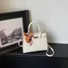 Bolsa Kelly com padrão de crocodilo transfronteiriça para mulheres, nova bolsa quadrada pequena versátil e da moda primavera-verão 2026 para ombro e crossbody