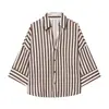 ¡Solo de comercio exterior! Nueva moda de primavera, manga larga, diseño holgado casual, top de camisa de nicho 2340939