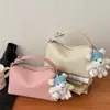 Bolso de mano de alta costura estilo coreano, bolso de hombro, nuevo modelo primavera 2026, bolso tipo almohada casual simple, bolso cruzado de nicho para mujer
