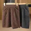 Falda de Lana 100% con Patrón de Burbujas en Relieve Tridimensional para Mujer Elástica de Cintura Alta Doble Bolsillo Punto Recto Bodycon Corta