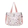 Mochila transfronteriza para estudiantes nuevos, simple, moderna, ligera, bolsa de mano versátil, perfecta para la escuela y tutorías, bolso de mano elegante
