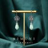 [Protección de color de prueba personal] nuevo estilo chino imitación jade Hetian orquídea moda nacional lujo ligero cheongsam aretes vintage aretes sentido de alta gama