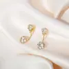 Aretes de Hilo Hueco Estilo Coreano Aguja Plateada Gama Alta Enrollado de Hilo Cuadrado Pequeño de Diamante Zirconia Aretes Sencillos Venta al por Mayor