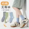 Calcetines holgados de color liso de algodón 100% con suela de masaje, sin costuras, a media pantorrilla, suaves y transpirables, versátiles para el hogar y el trabajo, calcetines casuales de algodón