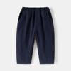 Pantalones para niños al por mayor 2025 nuevos pantalones casuales de color sólido para niños pantalones de moda para bebés coreanos una generación de cabello
