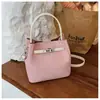 Comercio Exterior Transfronterizo Nueva Moda Bolso Kelly de Gama Alta Bolso de Mano Retro para el Trabajo Bolso Cubo Bolso de Hombro Cruzado Simple