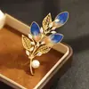 Broche de Veludo Azul Elegante Estilo Chinês de Alta Qualidade Sem Herança Broche Folheado a Ouro com Pedras Incrustadas Folha Anti-luz Feminino