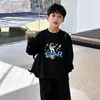 Camiseta de manga larga de algodón puro para niños, nuevo estilo primavera y otoño 2026, camisa holgada y elegante para niños pequeños, top de dibujos animados para niños mayores