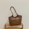 Bolso grande de mano estilo coreano para ir al trabajo, nuevo y moderno bolso de hombro de moda para el verano de 2026 con un estilo relajado