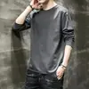 Camiseta de manga larga para hombre, capa interior de otoño para hombre, camiseta base elástica de corte holgado, camiseta estampada estilo coreano ins para hombre