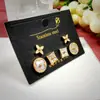 Pendientes de concha de trébol de cuatro hojas para mujer, parejas, diseño de nicho Dongdaemun Corea del Sur, pendientes de temperamento, tres pares de pendientes