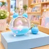 Perro blanco pequeño azul flotando en aceite, figura de cachorro en una botella de arena líquida, llavero de muñeca de dibujos animados lindo, regalo