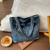 Bolso de Mezclilla Vintage para Mujer 2026 Nuevo de Moda Elegante Gran Capacidad Bolso para Viajar Casual de Nicho Bolso de Hombro Único