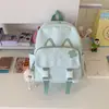 Linda mochila de dibujos animados estilo coreano para niñas, adecuada para estudiantes de secundaria, preparatoria y primaria, con protección para la columna vertebral