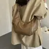 Bolso Bandolera de Gran Capacidad 2026 Tacto de Cuero Suave Versátil Simple Nuevo Estilo Bolso Dumpling Moda para Mujer Súper Popular para el Trabajo