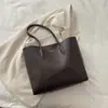 Bolsa de Grande Capacidade para Mulheres 2026 Primavera Novo Estilo Bolsa de Ombro Simples Popular Este Ano para Trabalho e Deslocamento Bolsa Tote de Cor Sólida