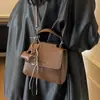 Bolso Pequeño Serie Niu para Mujer Estilo Nuevo 2025 Nicho Retro Casual Moda Versátil Bolso de Hombro Cruzado