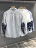Camisa blanca de otoño retro a la moda con retazos de cachemir estilo Hong Kong estilo japonés camisa fresca para hombre de manga larga