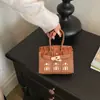 Bolso pequeño de moda transfronterizo 2026 nuevo mini bolso Kelly para niños accesorio de bolso cruzado de moda monedero