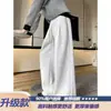 Calças casuais masculinas de corte solto estilo americano, design de bordado curvo resistente, calças compridas de marca da moda, calças esportivas fitean de perna larga