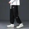 Pantalones casuales de pana para otoño para hombre, nuevos pantalones jogger de chenille patchwork de corte holgado, pantalones deportivos de marca de moda