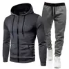 Nuevo conjunto de cremallera de color sólido con estampado de lunares estilo europeo y americano, que incluye una sudadera con capucha unisex forrada de polar y pantalones de chándal para otoño e invierno