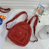 Mochila de lona para mujer, bolso de viaje, estilo Harajuku japonés, mochila pequeña plana y combinable con todo.