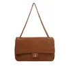 Yozzi 2026 otoño temprano nueva moda versátil de gran capacidad bolso de mano para la ciudad bolso de hombro casual simple texturizado