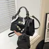 Bolsa de mão de nicho francesa feminina nova bolsa Kelly com padrão de pedra retrô bolsa de mão vintage bolsa transversal de moda