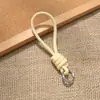 Bolsa de Corda de Couro PU Colorida Pingente Estilo Miu Simples Versátil Charme de Bolsa Chaveiro Acessório Lanyard de Celular Estilo Curto Novo