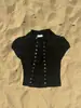 Estilo Novo de Verão Europeu e Americano Transfronteiriço Camisa de Cor Sólida com Botão Irregular com um Design Estiloso, Top de Manga Curta, Roupas Femininas Slim-Fit Atacado