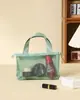 Bolsa Cosmética Colorida para Mujer Nueva Primavera Estilo Coreano Simple y Versátil Bolso de Mano Gran Capacidad Alta Apariencia Malla Transparente