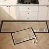 Alfombra de Piso de Barro de Diatomeas de Cachorro Lindo de Dibujos Animados Alfombra Especial para Piso de Cocina Absorción de Agua a Prueba de Aceite Resistente a la Suciedad Fácil de Limpiar Alfombra Venta al por Mayor