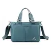 Bolsa de tela de nailon impermeable ligera mochila cruzada versátil nueva bolsa de mano portátil gran capacidad Bolso de hombro para mujer