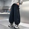 Calça de moletom infantil 2026, calça nova e estilosa para crianças de meia-idade e grandes, calça esportiva de primavera e outono, calça comprida, uso legal de outono, atacado
