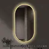 Espejo de baño inteligente ovalado en stock con lijado exterior e iluminación LED translúcida, adecuado para montaje en pared de baño y proyectos hoteleros, con opciones de personalización.