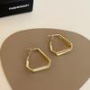 Brincos de Argola Geométricos de Metal Dourado Estilo Retro de Hong Kong Atacado Europeu e Americano Leve Luxo High-End para Mulheres