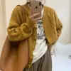 Suéter chaqueta de punto cárdigan versátil holgado vintage nuevo para otoño e invierno 2026 con cuello redondo y diseño de torsión simple para mujer