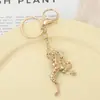 Moda Europea y Americana Rana de Diamante Llavero Colgante Personalidad de Nicho Cadena de Bolso Colgante para Teléfono Móvil Joyería Regalo Pequeño