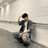 Conjunto Denim Vintage Nicho Estilo Coreano 2026 con Camisa Acolchada Desestructurada Desgastada y Pantalones Desgastados, Conjunto de Manga Corta de Moda