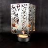 Suministro directo de fábrica candelabro de metal estilo europeo giratorio romántico dorado hueco producción de artesanías de velas de aromaterapia